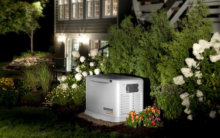 Generac backup generator outside of a home.