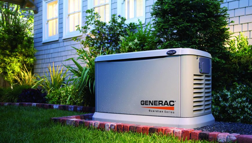 Generac generator installed next to a house.